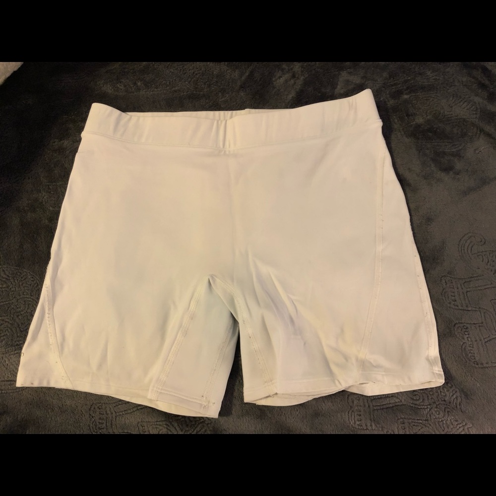 Under Armour compression shorts.